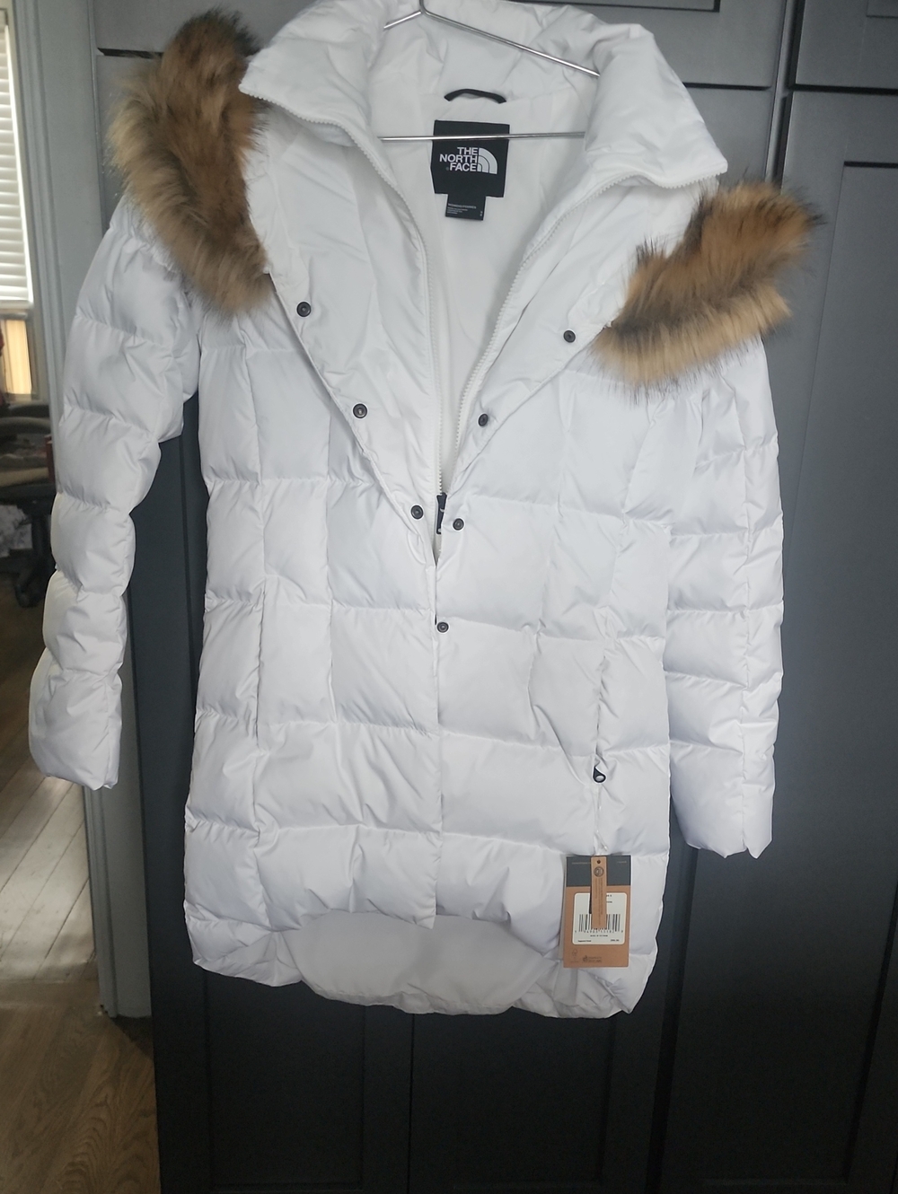 The North Face Women's White Puffer Coat with Faux Fur Trim